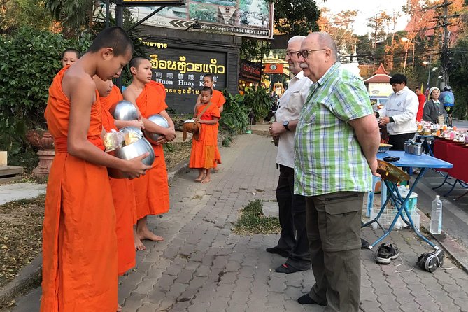 Alms and Wat Phra That Doi Suthep Private Chiang Mai Tour - Walking streets with a local: city lanes, not a drive-by