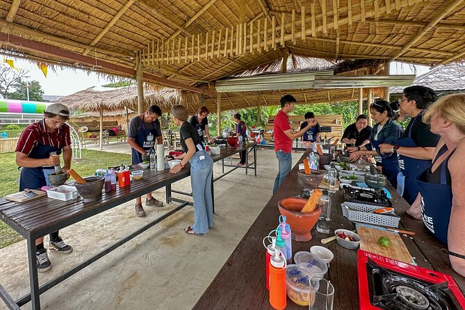 Aroidee’s Farm-Fresh Thai Cooking Experience - Collecting eggs and feeding the farm animals