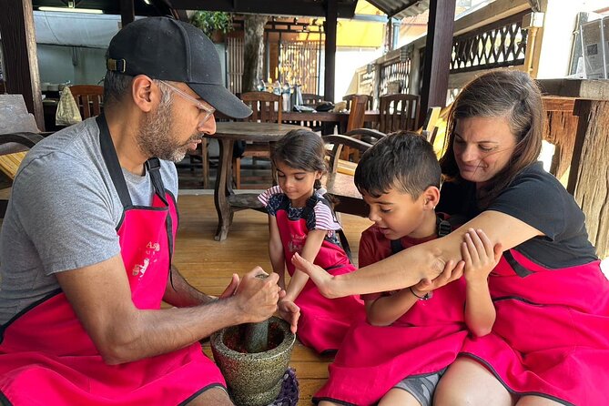 Authentic Thai Cooking Class and Farm Visit in Chiang Mai - Organic farm visit: herbs, produce, and the flavor connection