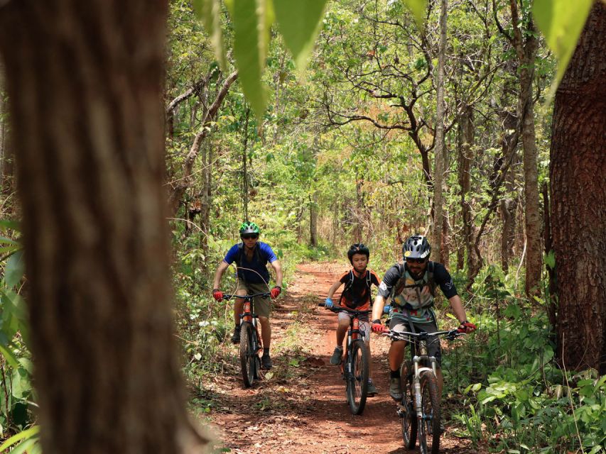 Chiang Mai: Boat Ride and Cycling Tour to Sticky Waterfall - Sticky Waterfall Bua Tong: Cooling Off on Multi-Tier Cascades