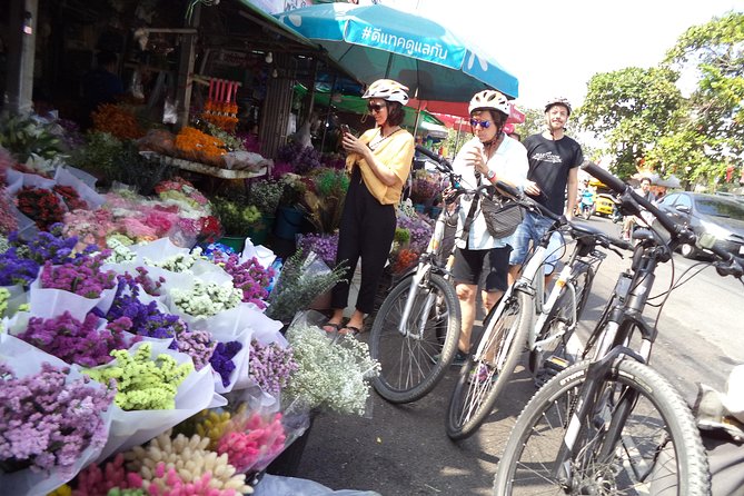Chiang Mai City Culture Half-Day Cycling Tour - More than temples: silversmith pause, Chinese community streets, and markets