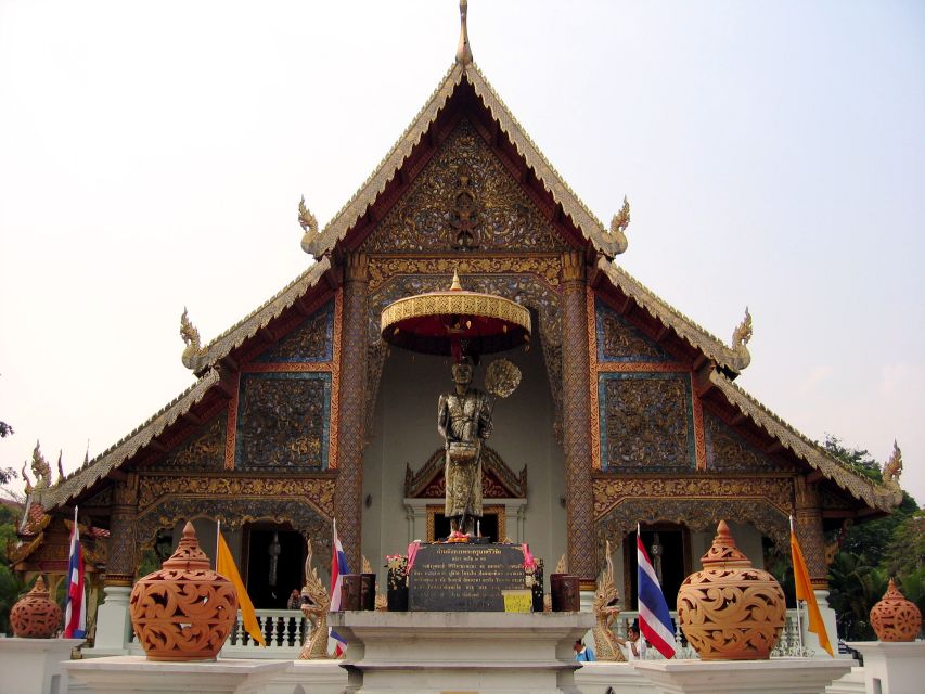 Chiang Mai: Guided Historical City Tour by Bike with Lunch - The 4-hour ride plan: temples, historic stops, and quieter lanes