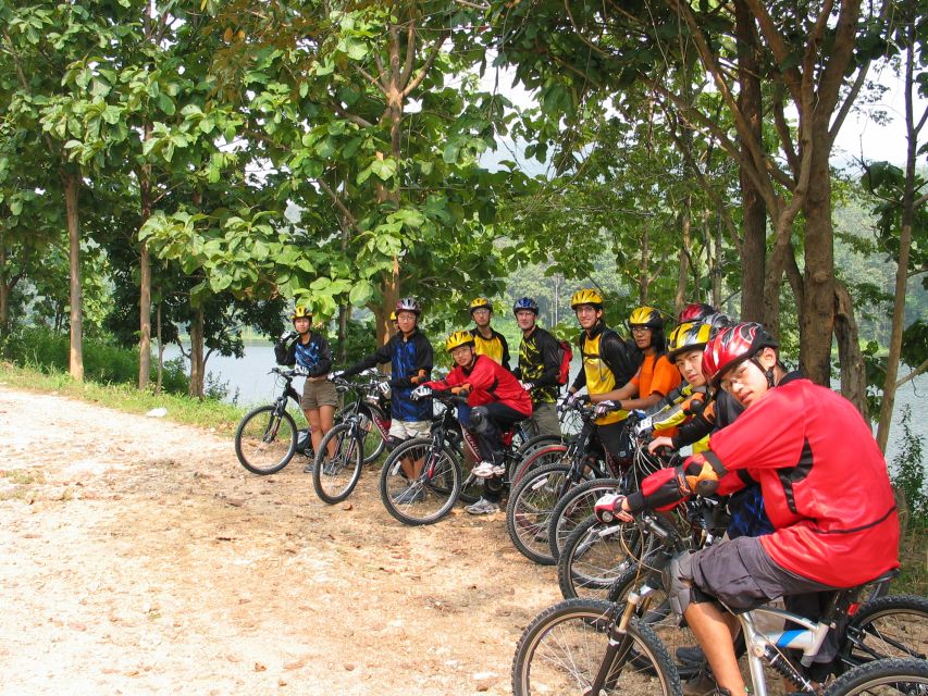 Chiang Mai: Rainforest Guided Mountain Biking Tour - Your first riding practice: temple stop, swimming option, and 3 hours of cycling