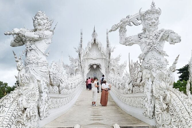 Chiang Rai Famed Temples and Golden Triangle Tour from Chiang Mai - Wat Rong Suea Ten, the Blue Temple: Time for Color and Carvings