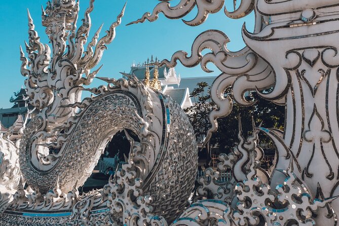 Chiang Rai Famed Temples and Golden Triangle Tour from Chiang Mai - Long Neck Karen Village: Quick Cultural Time, Big Expectations Check