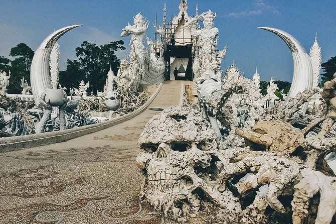 Chiang Rai Highlights Tour: White & Blue Temples and Black Museum - Blue Temple (Wat Rong Seua Ten): tiger legend and sharp color
