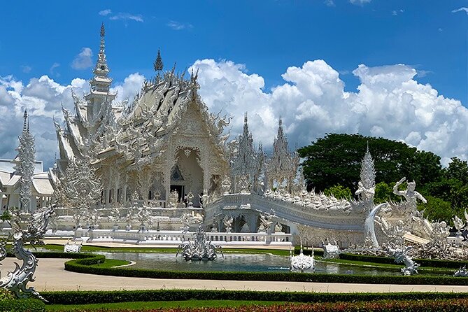 Chiang Rai Temples Private Tour from Chiang Mai - All Inclusive - Wat Rong Khun (White Temple): modern meets Buddhist symbolism