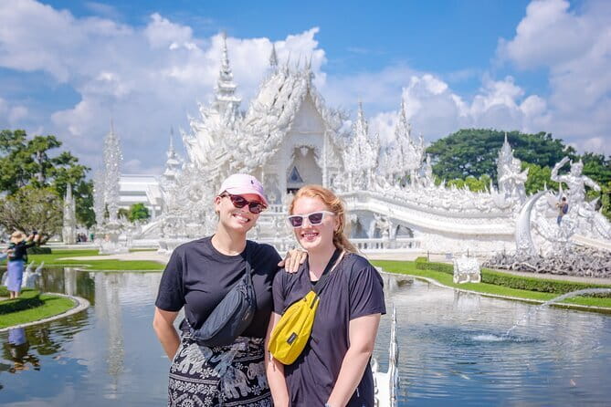 Chiang Rai White Blue Red Temples with Hot Spring from Chaing Mai - Wat Rong Khun White Temple: mirror details and Buddhist symbolism