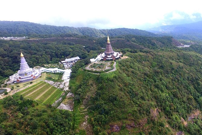 Discover Full Day Tour Doi Inthanon National Park from Chiang Mai - Stop 5, Doi Pui Mong Hill Tribe village area and the Hmong market break