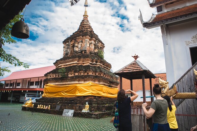 Experience The Real Chiang Mai by Bike - Park stops for fish-feeding and a needed breather