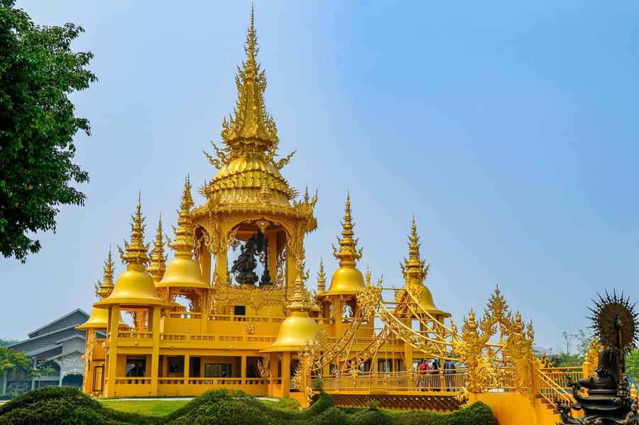 From Chiang Mai: Chiang Rai 2 Temples and Golden Triangle - Golden Triangle by longtail boat: beautiful, cultural, and sometimes time-questioned