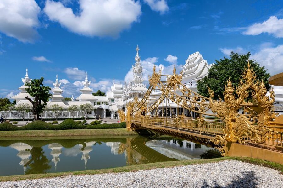 From Chiang Mai: Chiang Rai's Temples Exploration Day Trip - Wat Rong Suea Ten, the Blue Temple and tiger-lore