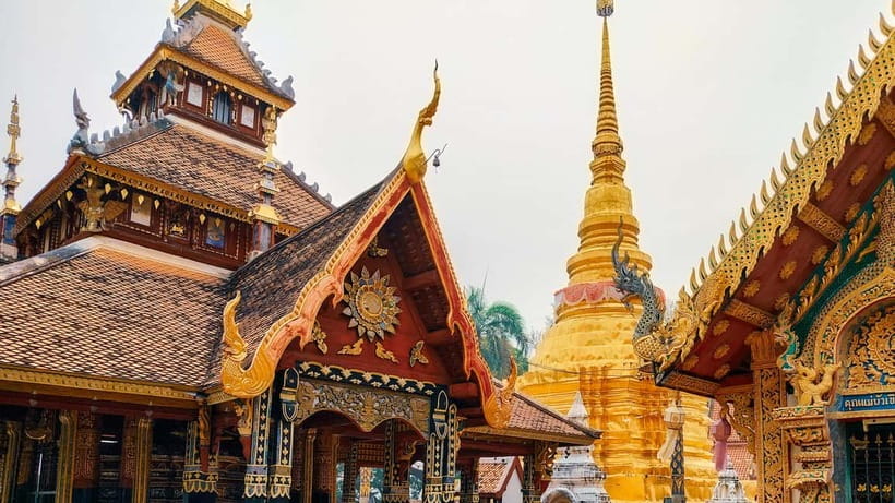 From Chiang Mai: UNESCO Site of Lampang & Lamphun Day Trip - Wat Phra That Lampang Luang: the golden-age chedi and a rare moment of light
