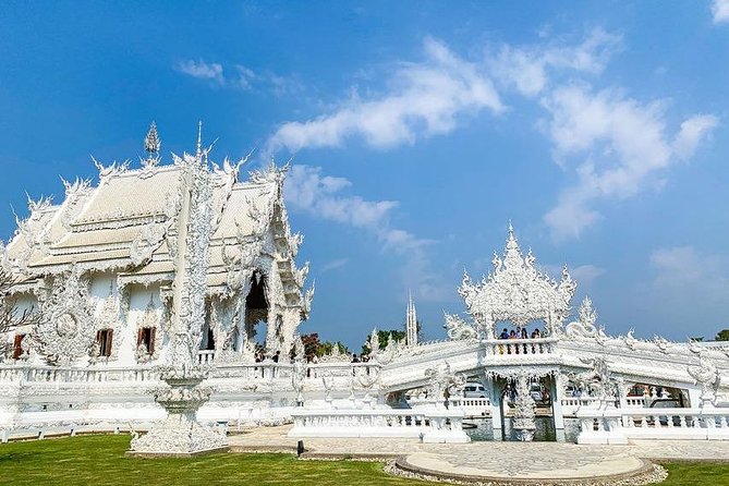 From Chiang Mai: White and Blue Temple & Golden Triangle Day Trip - Lunch at a local restaurant: included fuel for a long circuit