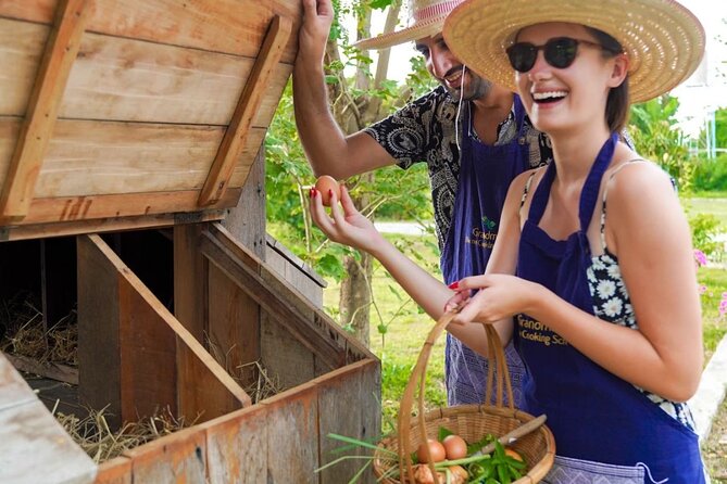 Full-Day Thai Cooking Class with Grandma - Market and Farm Tour - Inside the open-air kitchen: cooking 7 dishes at your own station