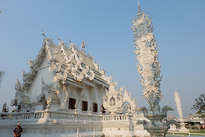Golden Triangle, White, Black, Blue Temple Full Day Tour From Chiang Mai - Baan Dam Black House Museum: Quirky Architecture Break From the Temples