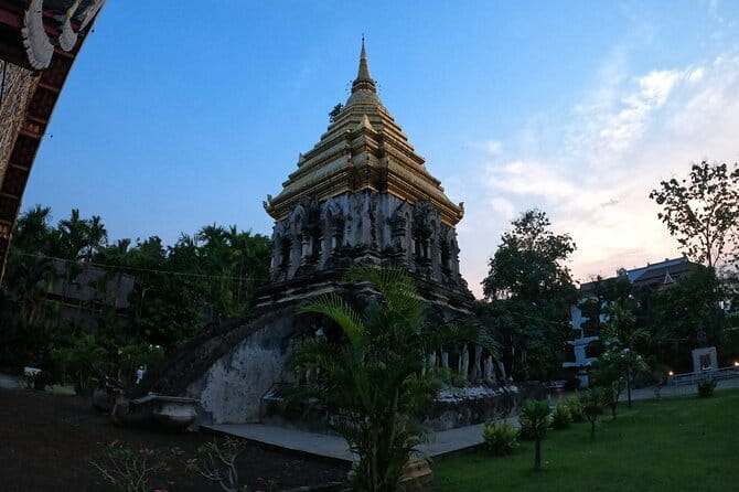 Guided Chiang Mai City Night Tour by EV Tram - Stop 1: Three Kings Monument and the city pillar story