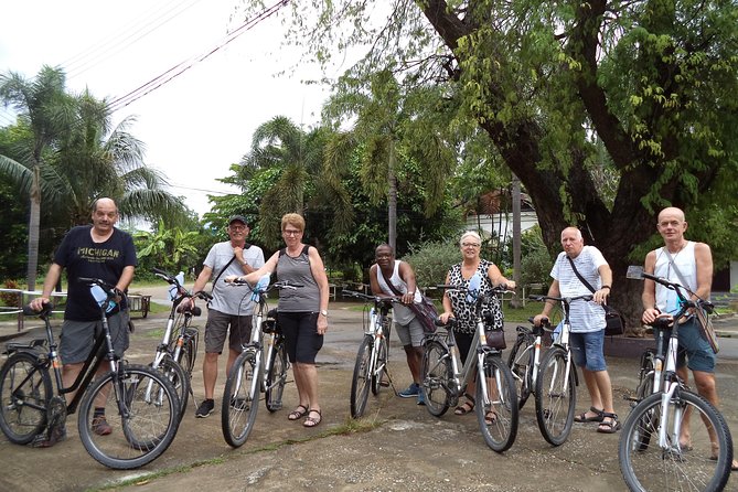 Half-Day Colors of Chiang Mai Biking Tour - Nam Thong Fresh Market: a snack break with local flavors