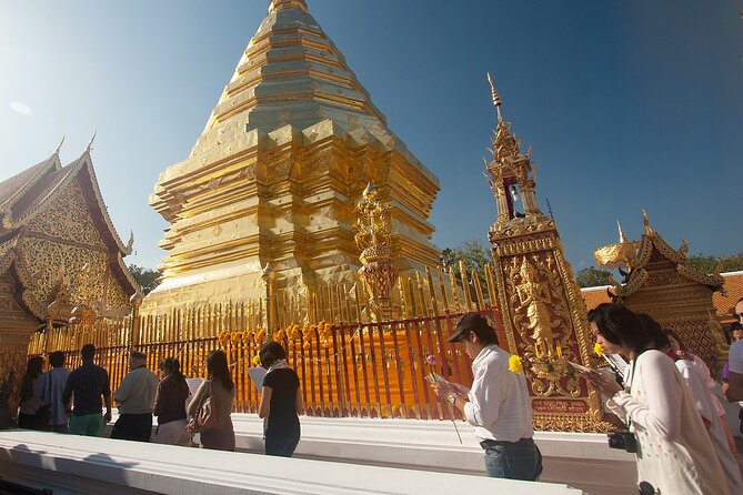 Half-Day Private Tour Wat Phra That Doi Suthep and Temples of Chiang Mai - Wat Suan Dok’s relic pagoda and the whitewashed tomb garden