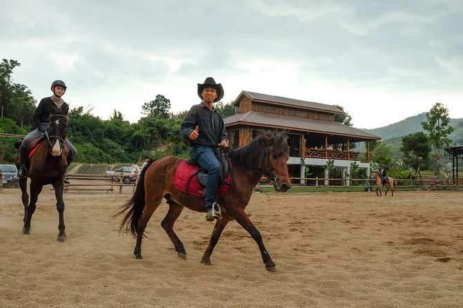 Horse Lesson+Riding+Wat Tonkwen wooden temple.Chiangmai - Wat Ton Kwen, a carved wooden temple in the morning light