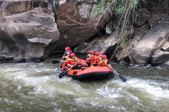 Khampan Rafting: White Water Rafting Guided Adventure in Chiang Mai - Phachee waterfall: swim, jump, and slide down the cliff