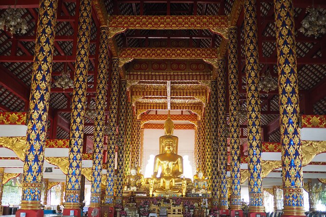 Lady Driver and Guide - Silver Temple at Wat Sri Suphan: a different look than the usual gold-and-gilt