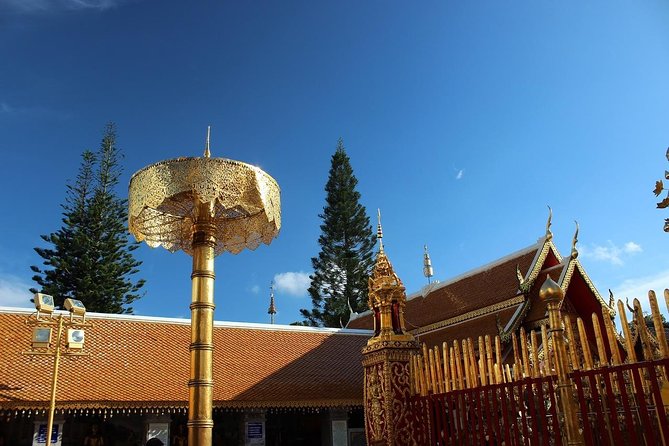 Royal Residence & Wat Phrathat Doi Suthep Half Day Tour From Chiang Mai - How the guide and included tickets improve the day