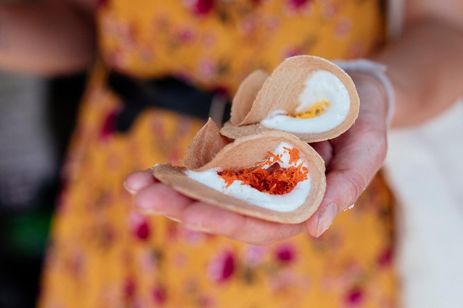 The 10 Tastings of Chiang Mai With Locals: Private Street Food Tour - Stop 3: Chang Phuak Gate (Elephant Gate) and a local restaurant bite