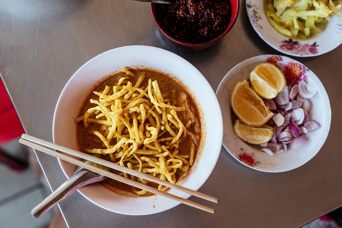 The 10 Tastings of Chiang Mai With Locals: Private Street Food Tour - Stop 4: Wat Mo Kham Tuang, and why temples and food fit together