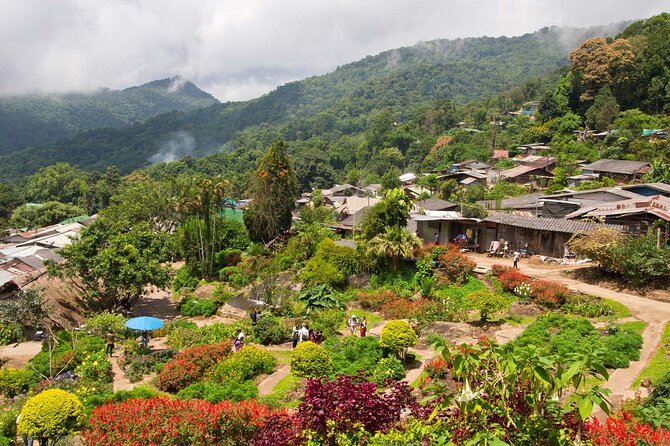 Wat Phra That Doi Suthep & Hmong Village Half Day Tour From Chiang Mai - Price and value: Is $32.18 per person a smart deal?