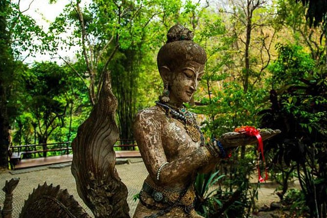 Wat Prathad DoiSuthep Sunrise+Giving alms to the monks Private Tour - Wat Umong tunnels: exploring chedi areas and feeding the pond animals