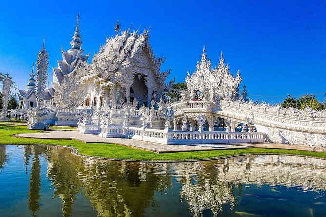 White, Red/Black and Blue Temples Full Day Trip From Chiang Mai - Wat Rong Khun (White Temple): Respectful Dress and Smart Photo Timing