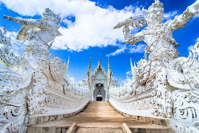White Temple, Blue Temple, Black House 1-Day Trip from Chiang Mai - Entering Wat Rong Khun, the White Temple With Pop-Culture Murals